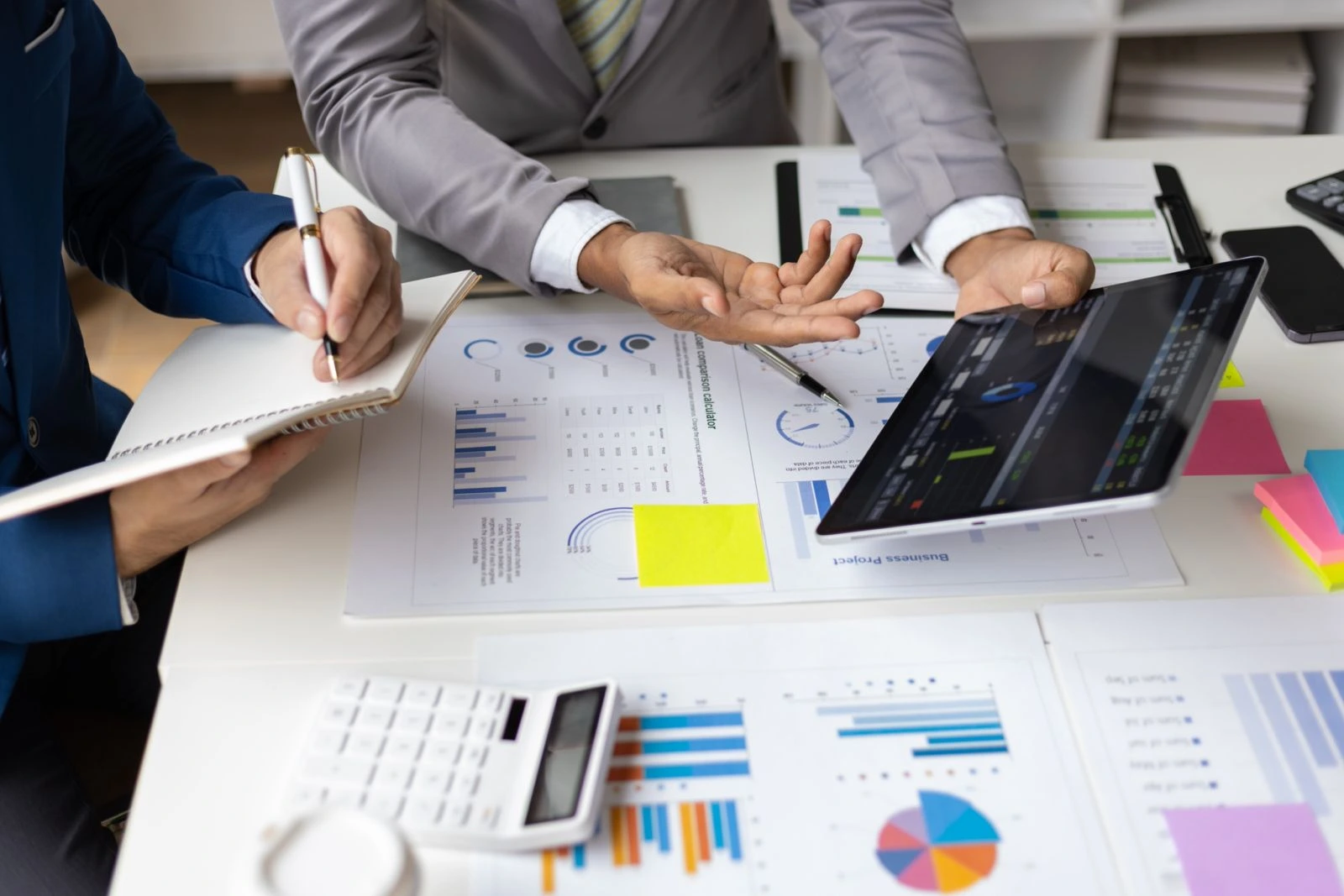 Team reviewing financial data and charts