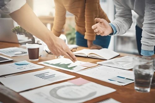 Team discussing financial reports and strategy in office